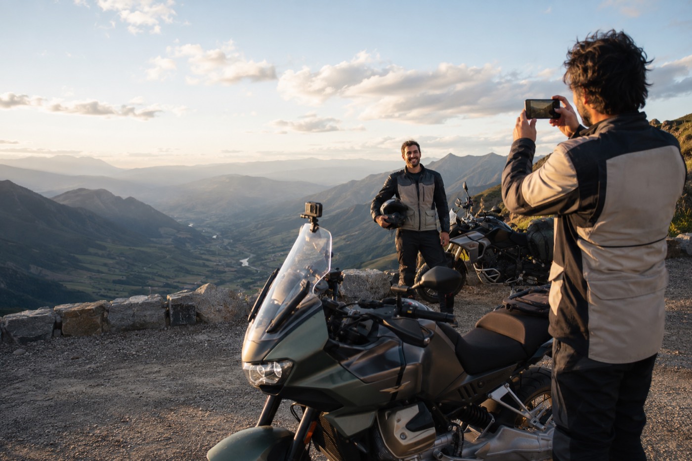 Riders taking a photo during a mountain ride stop.